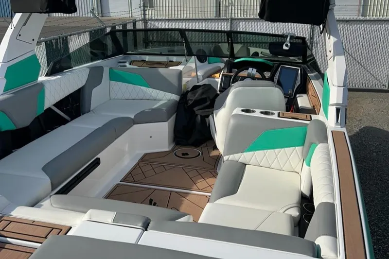 Slide: The Image of 2022 Tigé Z3 boat interior with modern seating and dashboard. - 6