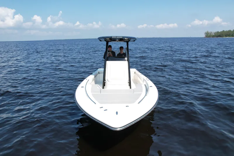 Slide: The Image of 2022 ShearWater 270 Carolina Flare boat on open water, front view. - 2