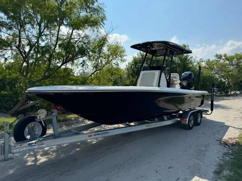 Slide: The Image of 2022 ShearWater 270 Carolina Flare boat on trailer, parked outdoors. - 20