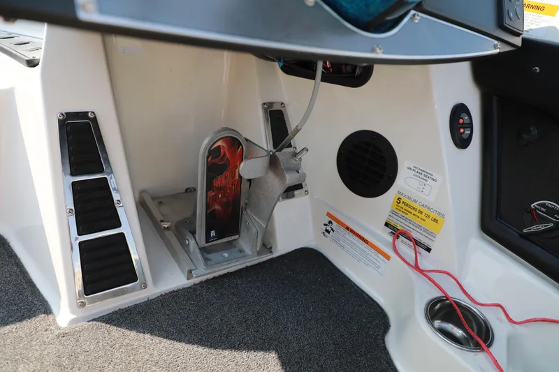 Slide: The Image of 2018 Ranger 521C boat interior with foot pedal and control panel. - 11
