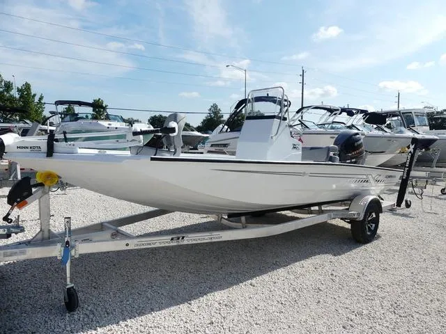 Slide: The Image of 2025 Xpress Boats H190B on trailer in sunny outdoor showroom. - 2