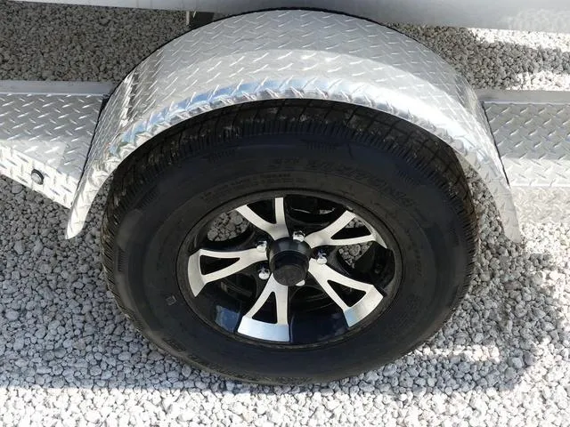 Slide: The Image of 2025 Xpress Boats H190B with Yamaha engine on trailer in sunny outdoor setting. - 4