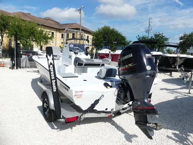 Slide: The Image of 2025 Xpress Boats H190B with 90 horsepower engine, displayed outdoors. - 5
