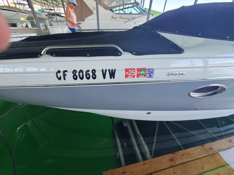 Slide: The Image of 2021 NauticStar 243 DC boat docked with registration number CF 8068 VW. - 18