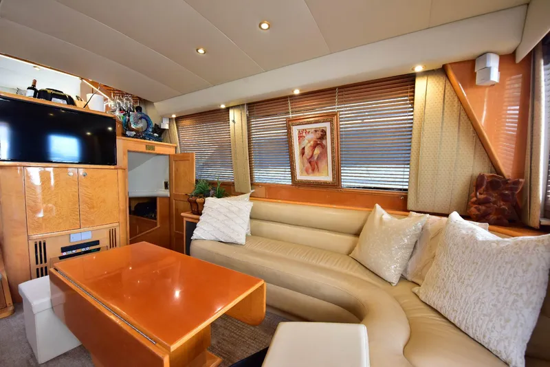 Slide: The Image of Luxurious 2004 Navigator Rival yacht interior with plush seating and elegant decor. - 19
