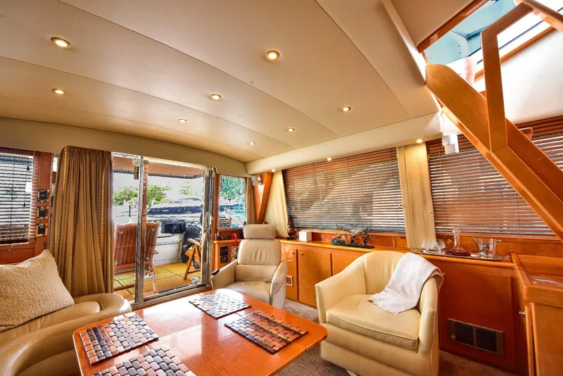 Slide: The Image of Luxurious 2004 Navigator Rival yacht interior with elegant seating and wooden accents. - 20