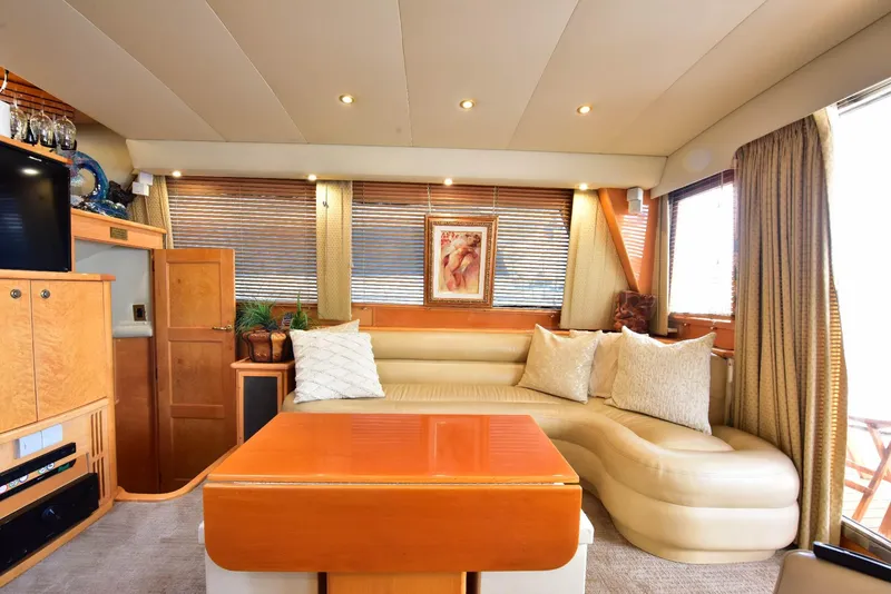 Slide: The Image of Luxurious 2004 Navigator Rival yacht interior with plush seating and elegant decor. - 21