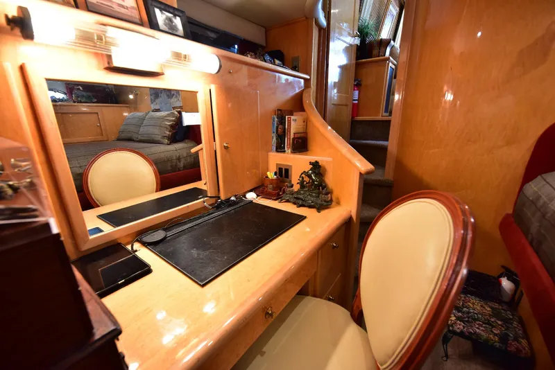 Slide: The Image of Luxurious 2004 Navigator Rival yacht interior with elegant wooden desk and chair. - 28