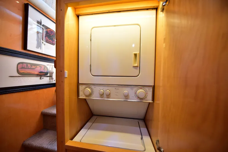 Slide: The Image of 2004 Navigator Rival RV with built-in washer and dryer unit. - 44