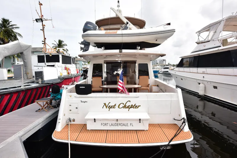 Slide: The Image of 2004 Navigator Rival yacht "Next Chapter" docked in Fort Lauderdale marina. - 6