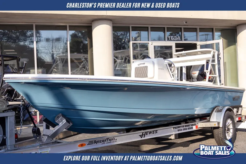 The Image of 2025 Hewes Redfisher 16 boat on trailer, displayed outdoors at a dealership. - 0
