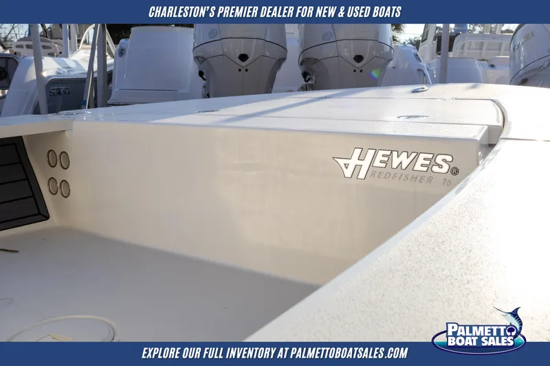 Slide: The Image of 2025 Hewes Redfisher 16 boat console with rod holders, showcased by Palmetto Boat Sales. - 14