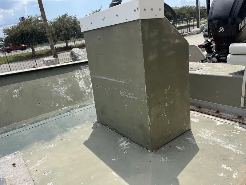 Slide: The Image of Old Nova 20 boat interior with weathered paint and motor, year 2000. - 8