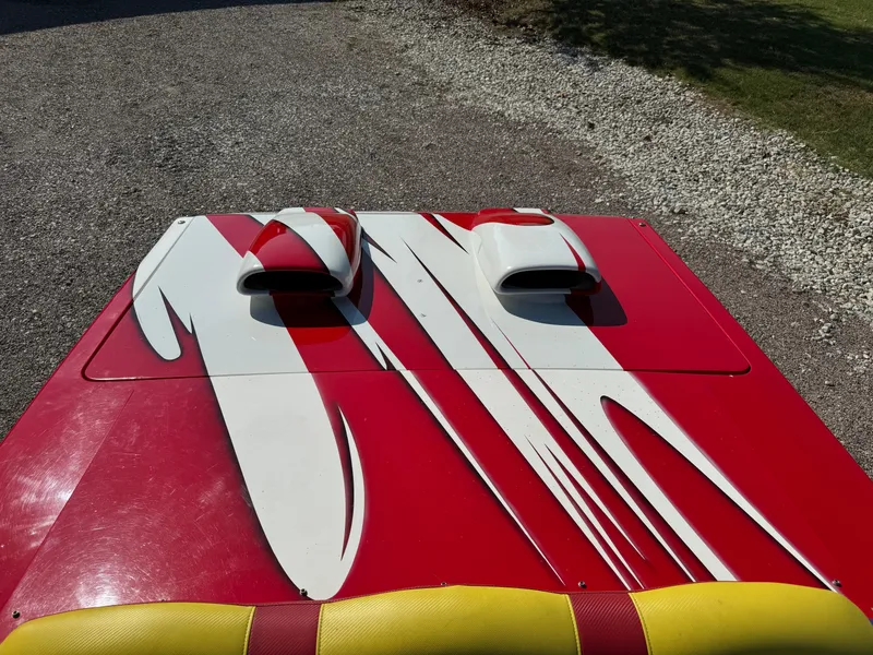 Slide: The Image of Red and white 2002 Cigarette 36 Gladiator boat with bold graphics. - 18