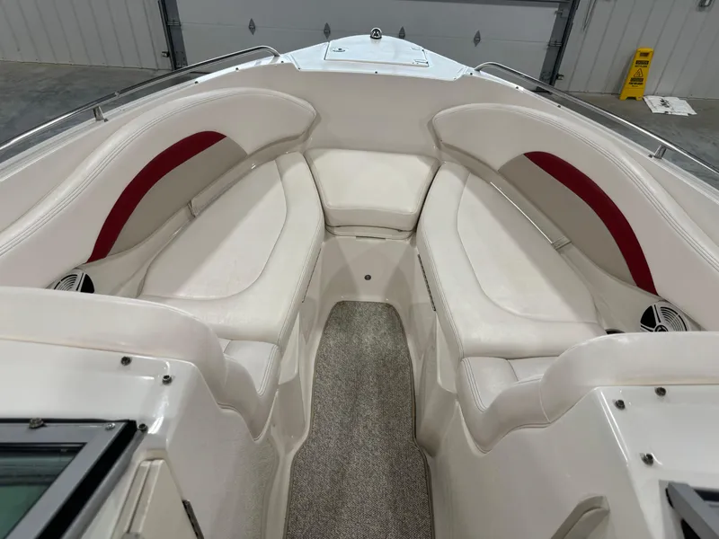 Slide: The Image of Interior of 2011 Chaparral 267 SSX boat with white and red seating. - 11