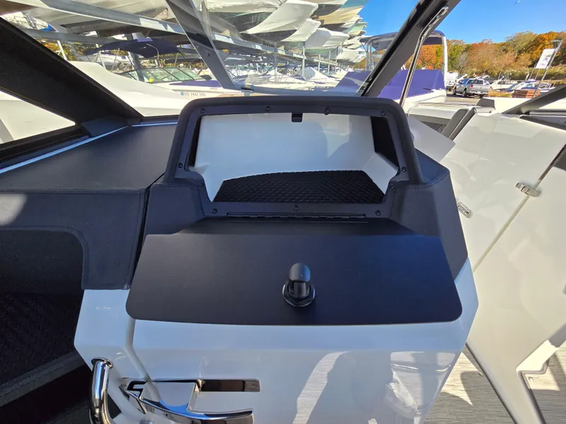 Slide: The Image of 2025 Cobalt R8 boat dashboard with modern design and sleek controls. - 12