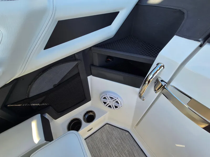 Slide: The Image of Interior of 2025 Cobalt R8 boat with speaker and storage compartments. - 13