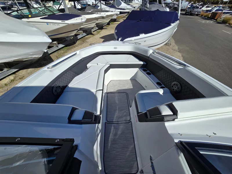 Slide: The Image of 2025 Cobalt R8 boat interior with spacious seating and modern design. - 16