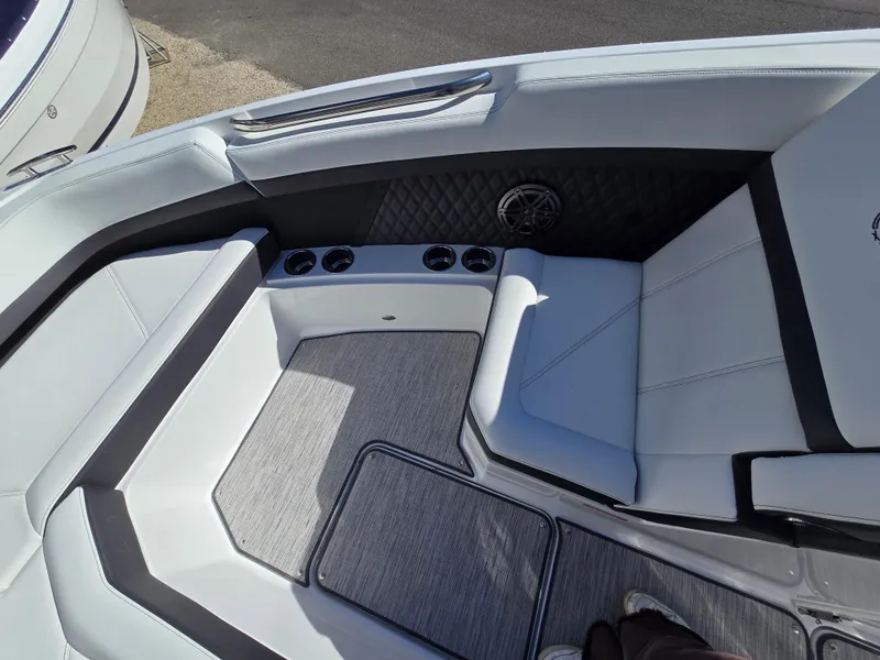 Slide: The Image of Luxurious seating area in 2025 Cobalt R8 boat with cup holders and premium upholstery. - 17