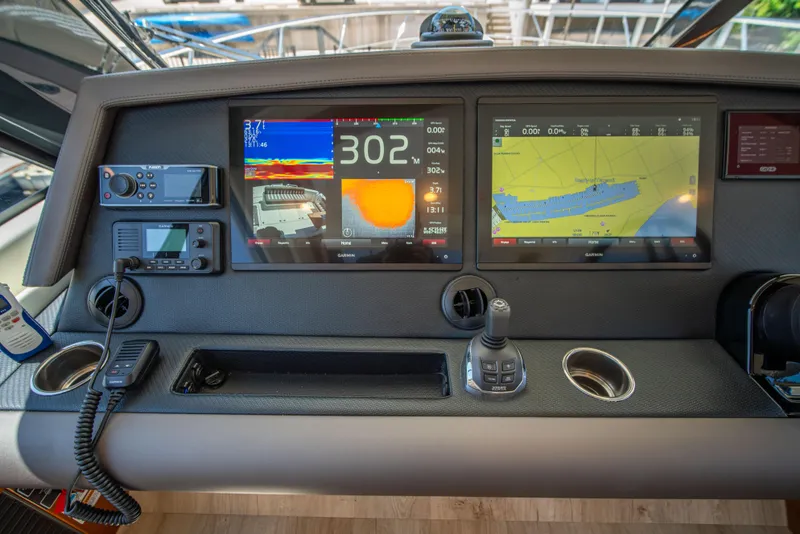 Slide: The Image of 2020 Riviera 525 SUV dashboard with navigation and control systems. - 20