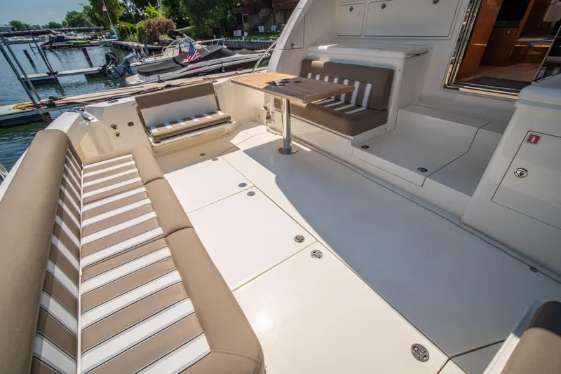 Slide: The Image of Luxurious 2020 Riviera 525 SUV yacht with spacious seating and elegant design. - 3