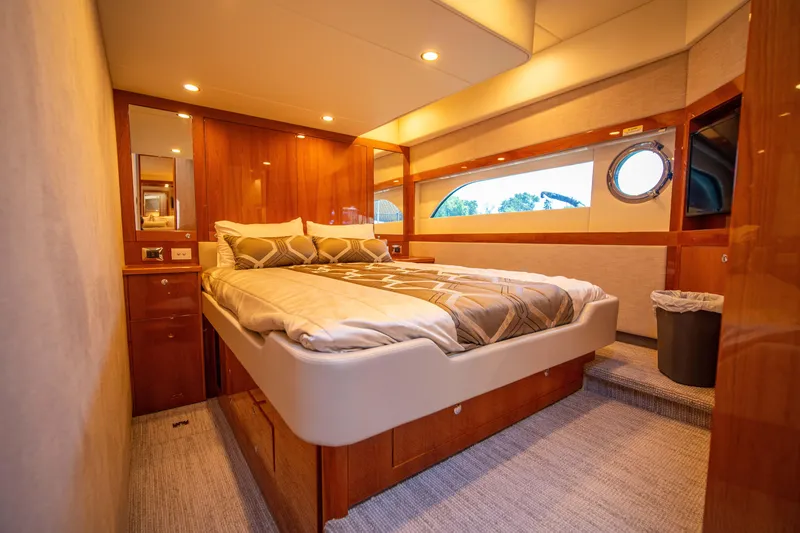Slide: The Image of Luxurious bedroom interior of 2020 Riviera 525 SUV yacht. - 39