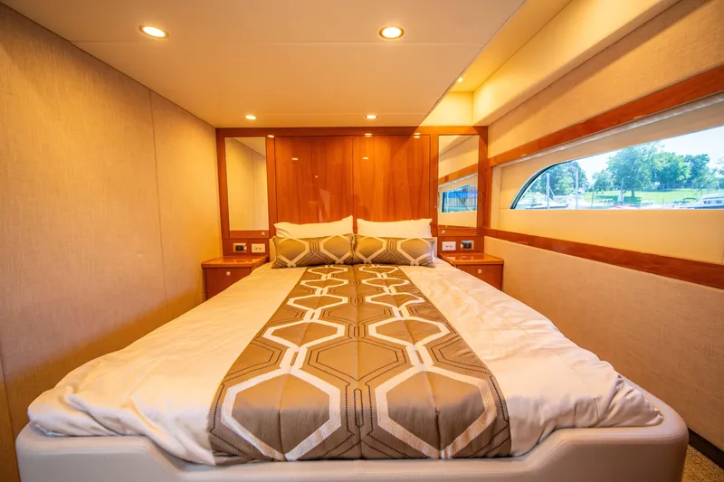 Slide: The Image of Luxurious bedroom interior of 2020 Riviera 525 SUV yacht with modern design. - 40