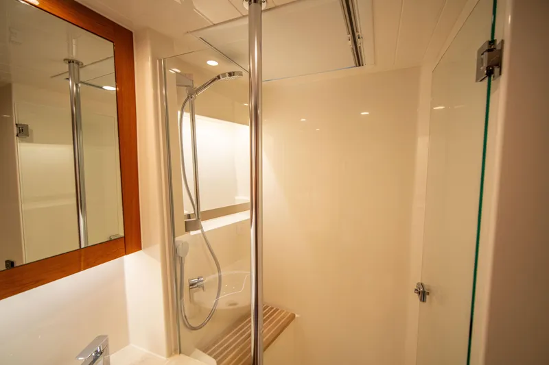 Slide: The Image of Luxurious bathroom in 2020 Riviera 525 SUV yacht with modern shower design. - 45