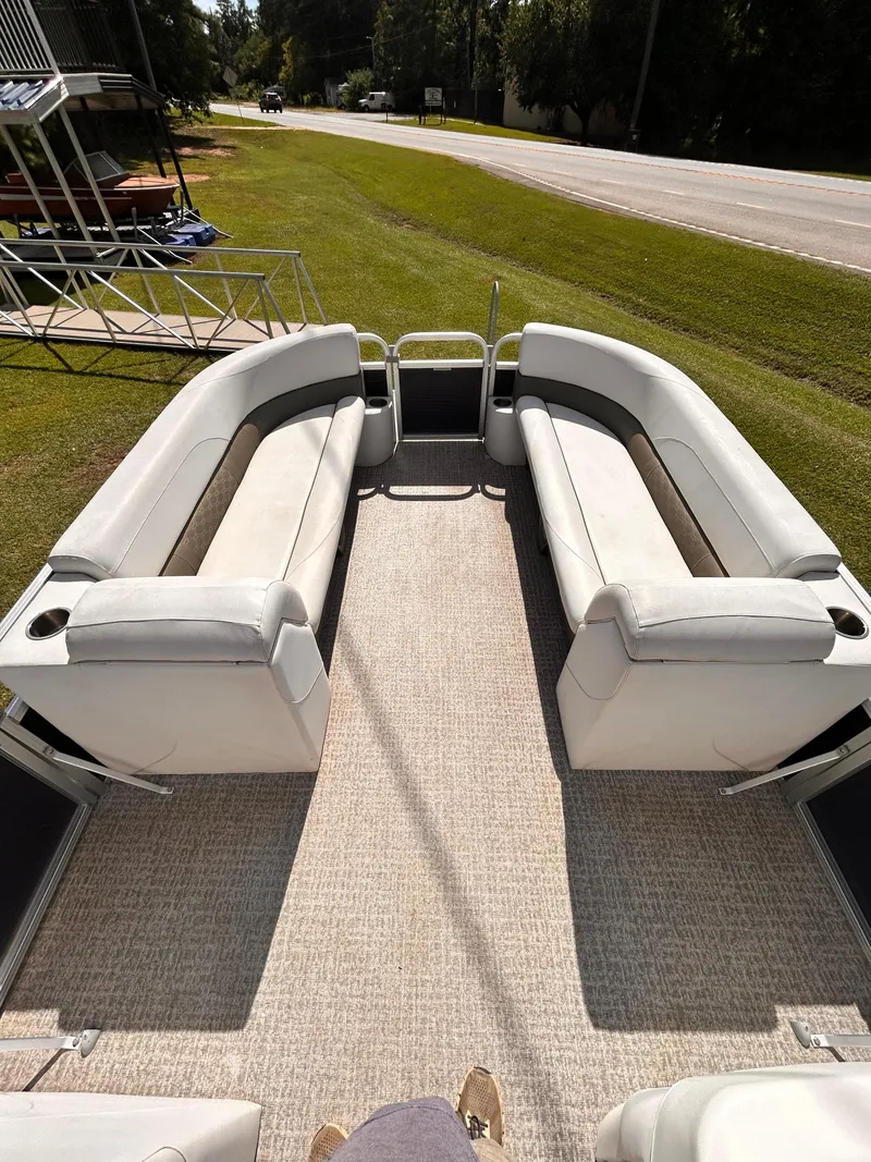 Slide: The Image of 2019 Avalon GS Cruise 25' pontoon boat with spacious seating and carpeted deck. - 9