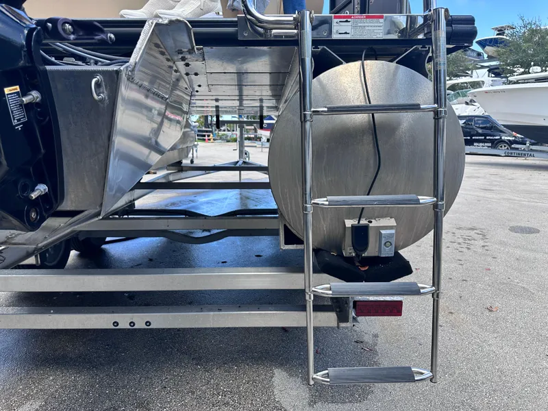 Slide: The Image of 2023 Harris Cruiser 230 boat ladder and pontoon detail. - 20