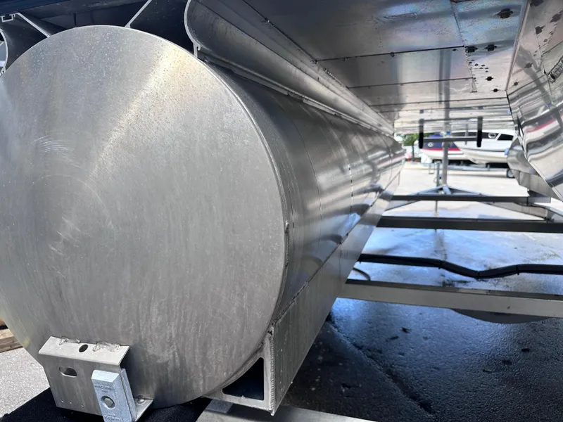 Slide: The Image of 2023 Harris Cruiser 230 pontoon boat underside, showcasing aluminum construction and structural details. - 21