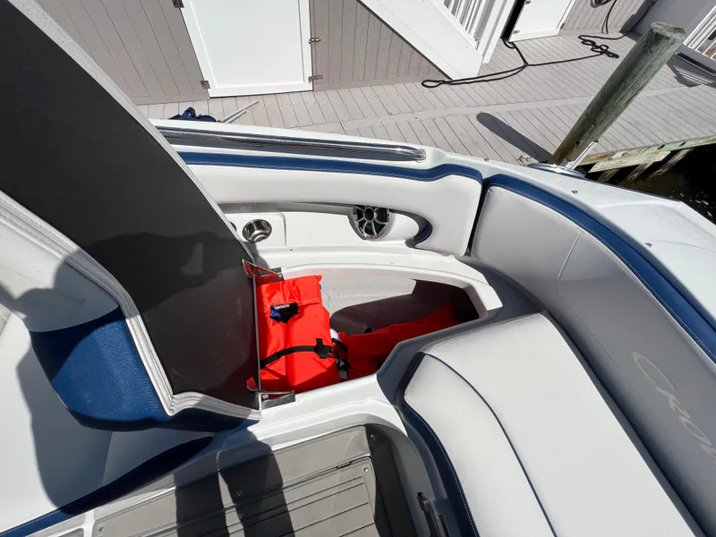 Slide: The Image of 2022 Crownline E305 XS Forward Seating Storage 3 - 11
