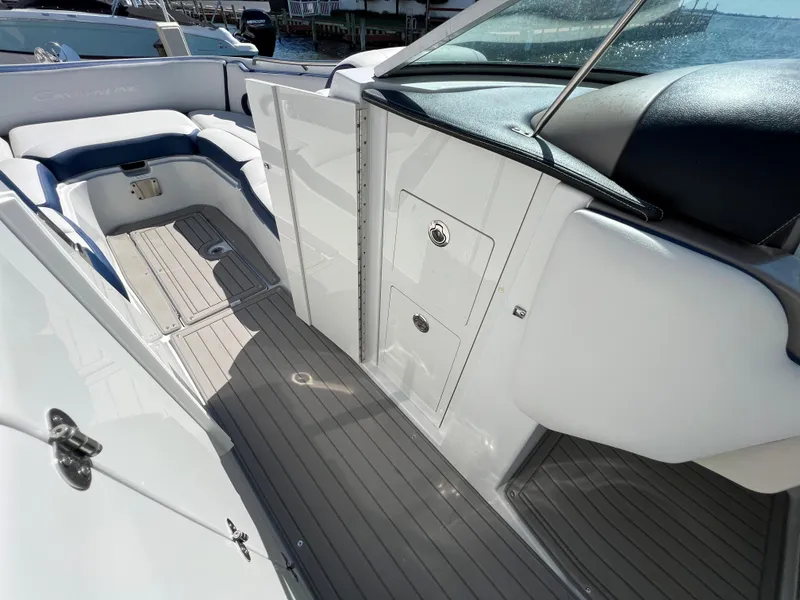 Slide: The Image of 2022 Crownline E305 XS Starboard Helm Storage - 14