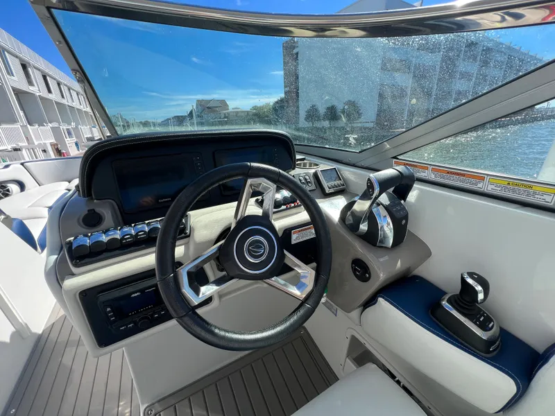 Slide: The Image of 2022 Crownline E305 XS Helm - 17