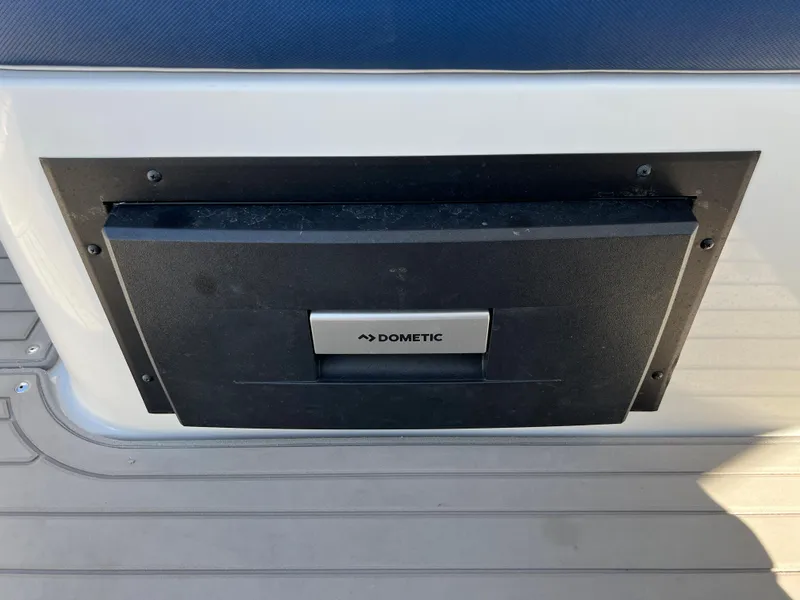 Slide: The Image of 2022 Crownline E305 XS Cockpit Refrigerator Drawer - 25