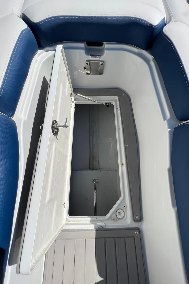 Slide: The Image of 2022 Crownline E305 XS Forward In-Floor Storage - 26