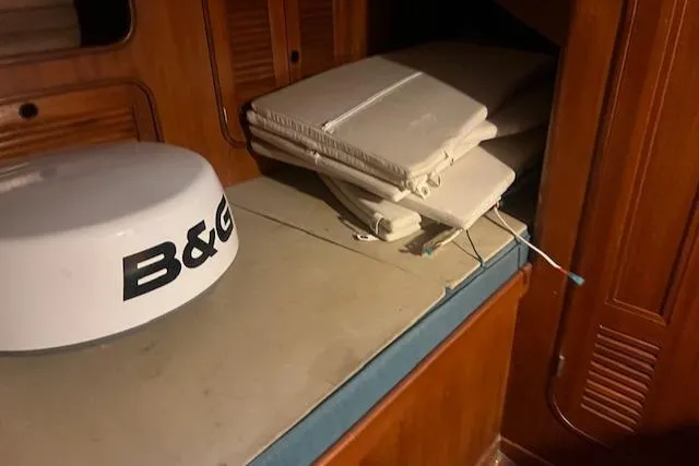 Slide: The Image of Interior of 1984 Mason 43 Cutter with B&G equipment and folded cushions. - 26