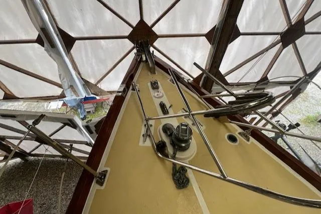 Slide: The Image of Deck view of 1984 Mason 43 Cutter sailboat under cover. - 40