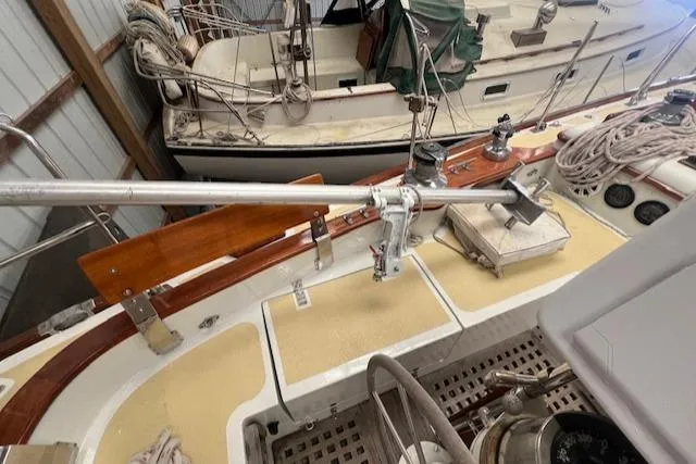 Slide: The Image of 1984 Mason 43 Cutter sailboat deck with rigging and equipment in storage. - 42