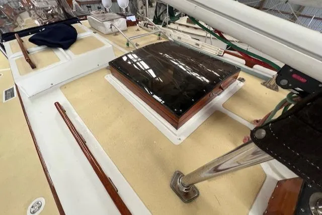 Slide: The Image of 1984 Mason 43 Cutter deck with hatch and rigging details. - 46