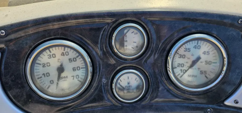 Slide: The Image of Dashboard gauges of 2017 G3 Sun Catcher V322C boat. - 12