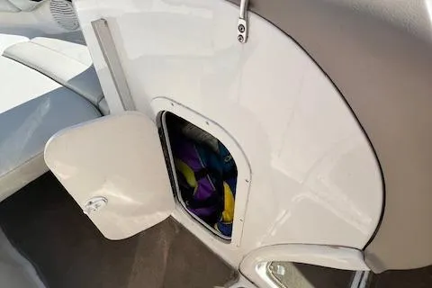 Slide: The Image of Open storage compartment on 2002 Chaparral 220 SSi boat interior. - 13