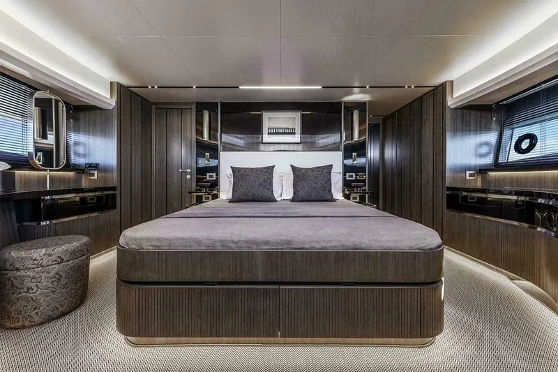 Slide: The Image of Luxurious bedroom interior of 2025 Pearl 72 yacht with modern design and elegant furnishings. - 14