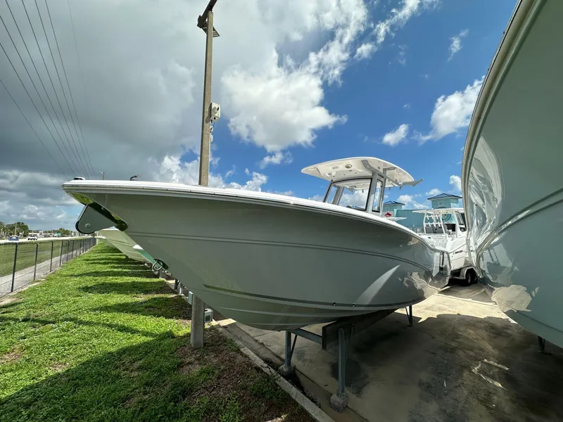 The Image of 2025 Sea Fox 268 Commander boat displayed outdoors under a cloudy sky. - 1