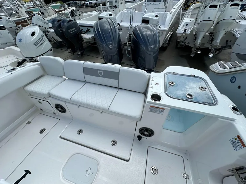 Slide: The Image of 2025 Sea Fox 268 Commander boat interior with seating and storage compartments. - 11