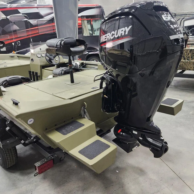 Slide: The Image of 2024 Crestliner 1860 Retriever SC with Mercury outboard motor in a showroom. - 12