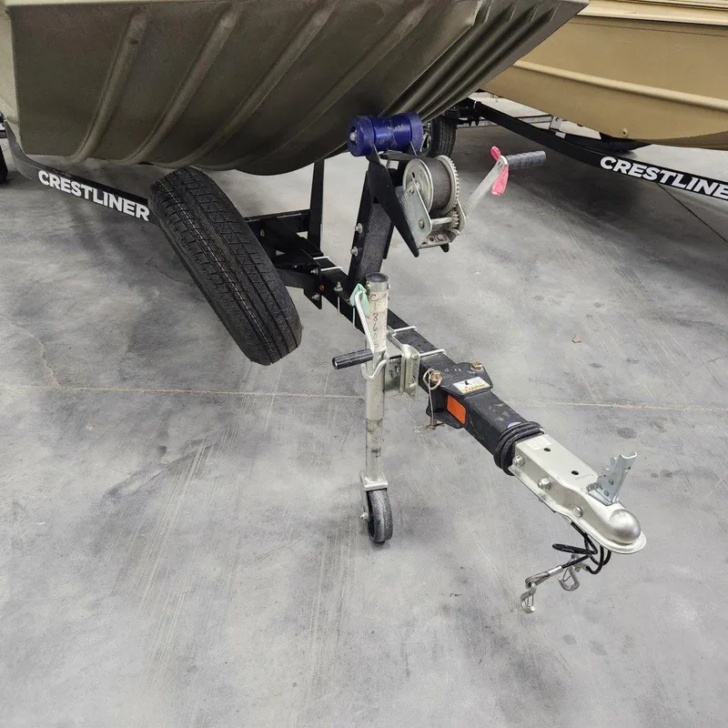 Slide: The Image of 2024 Crestliner 1860 Retriever SC boat trailer hitch and winch on concrete floor. - 14