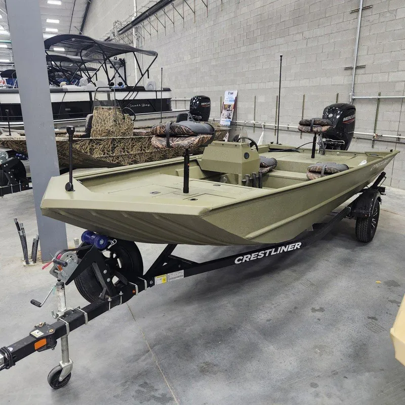 Slide: The Image of 2024 Crestliner 1860 Retriever SC boat on trailer in showroom. - 5