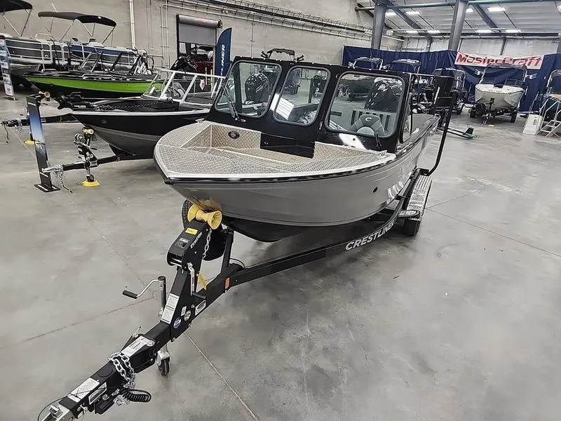 Slide: The Image of 2024 Crestliner 2050 Commander Elite boat on display in showroom. - 20