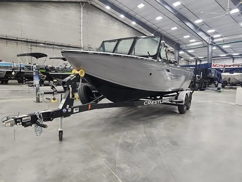 Slide: The Image of 2024 Crestliner 2050 Commander Elite boat on trailer in showroom. - 7